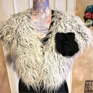 Woman’s sweater vest with fun fur on front- size medium- cute layering piece